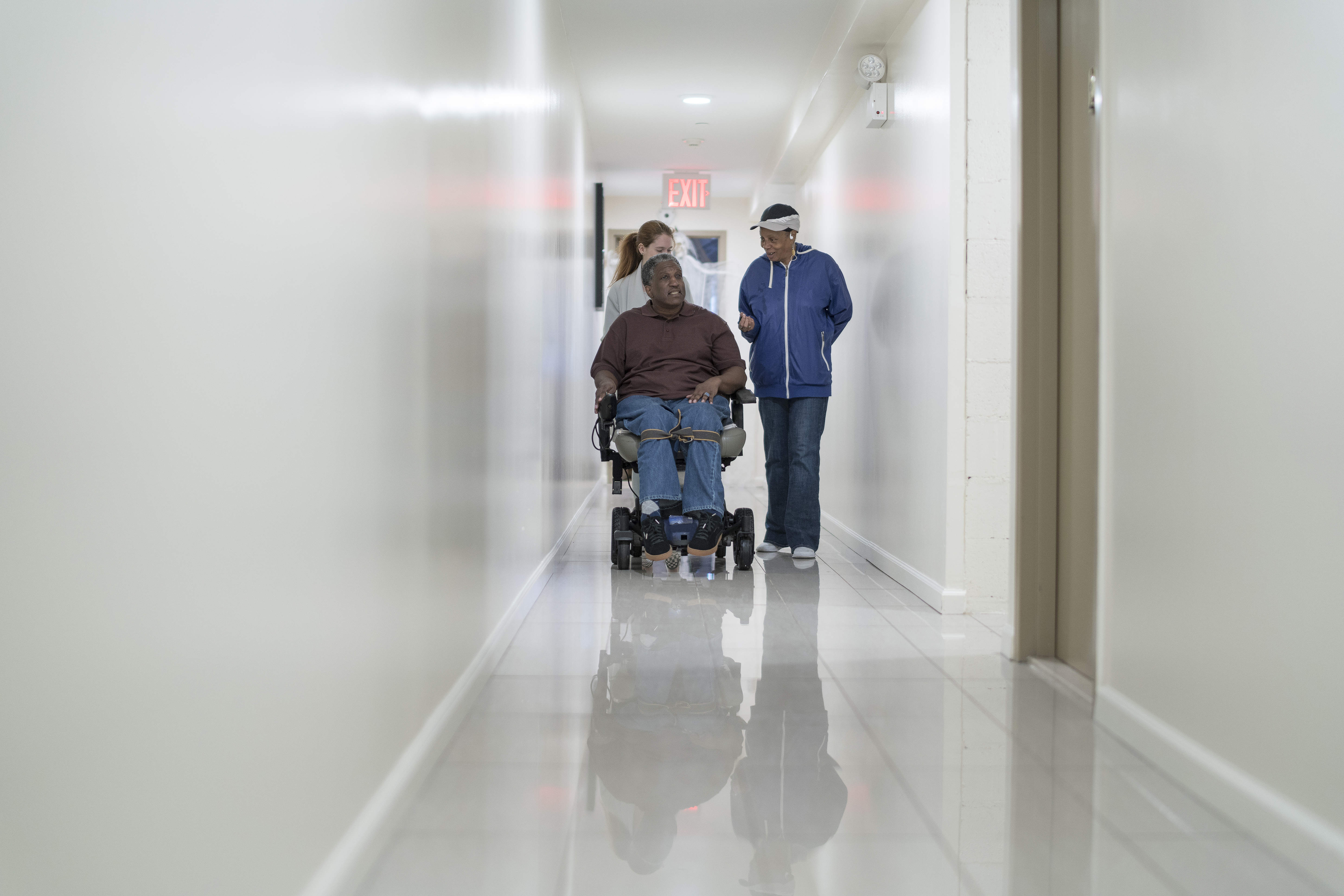 Ambulatory Wheelchair User in Hallway
