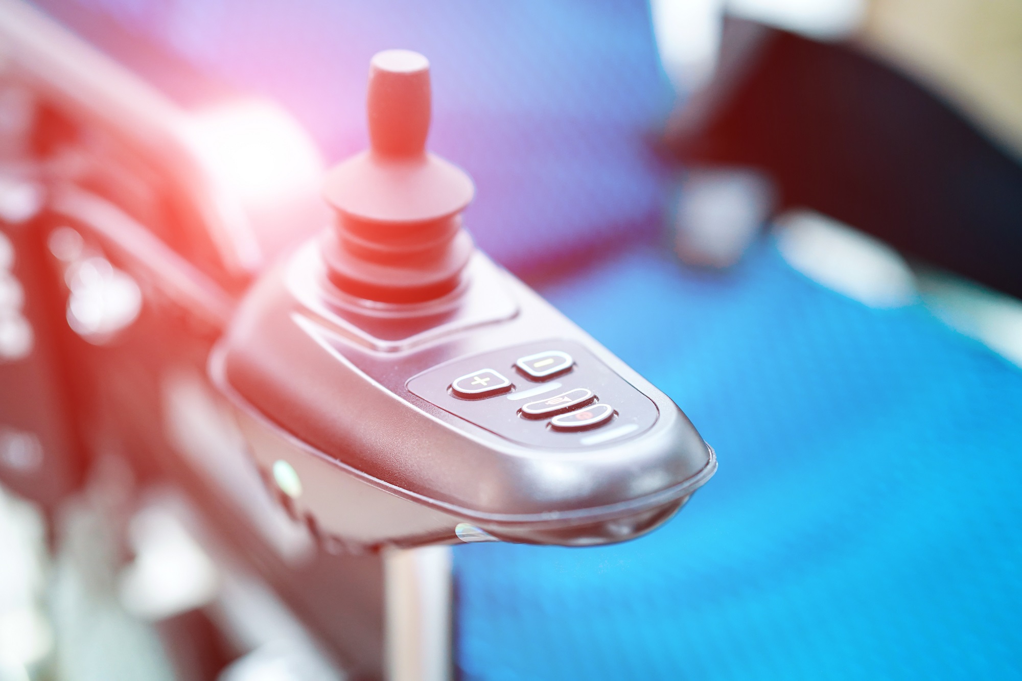 Close up image of an electric wheelchair.