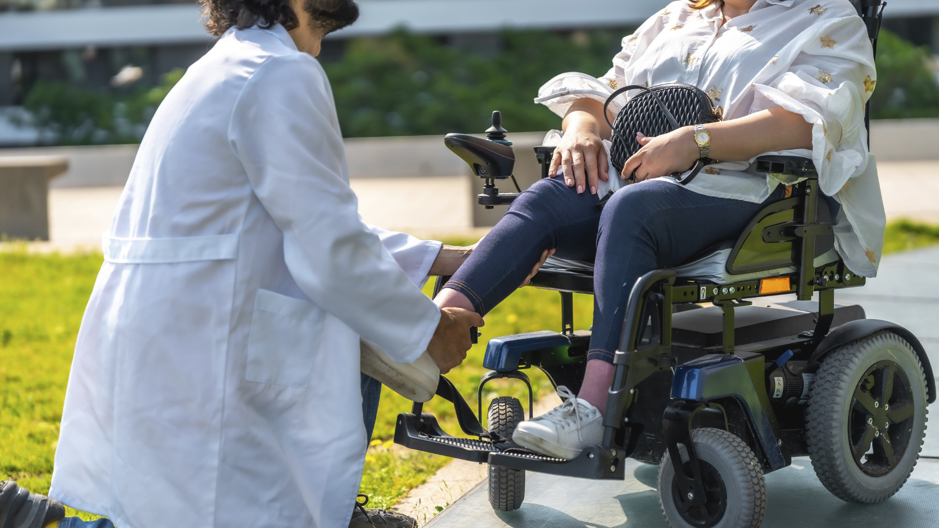 Doctor Helping Adjust Foot