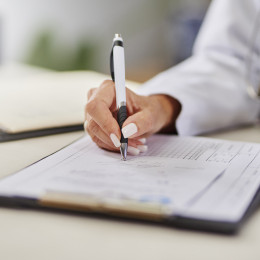 Doctor Writing a Prescription