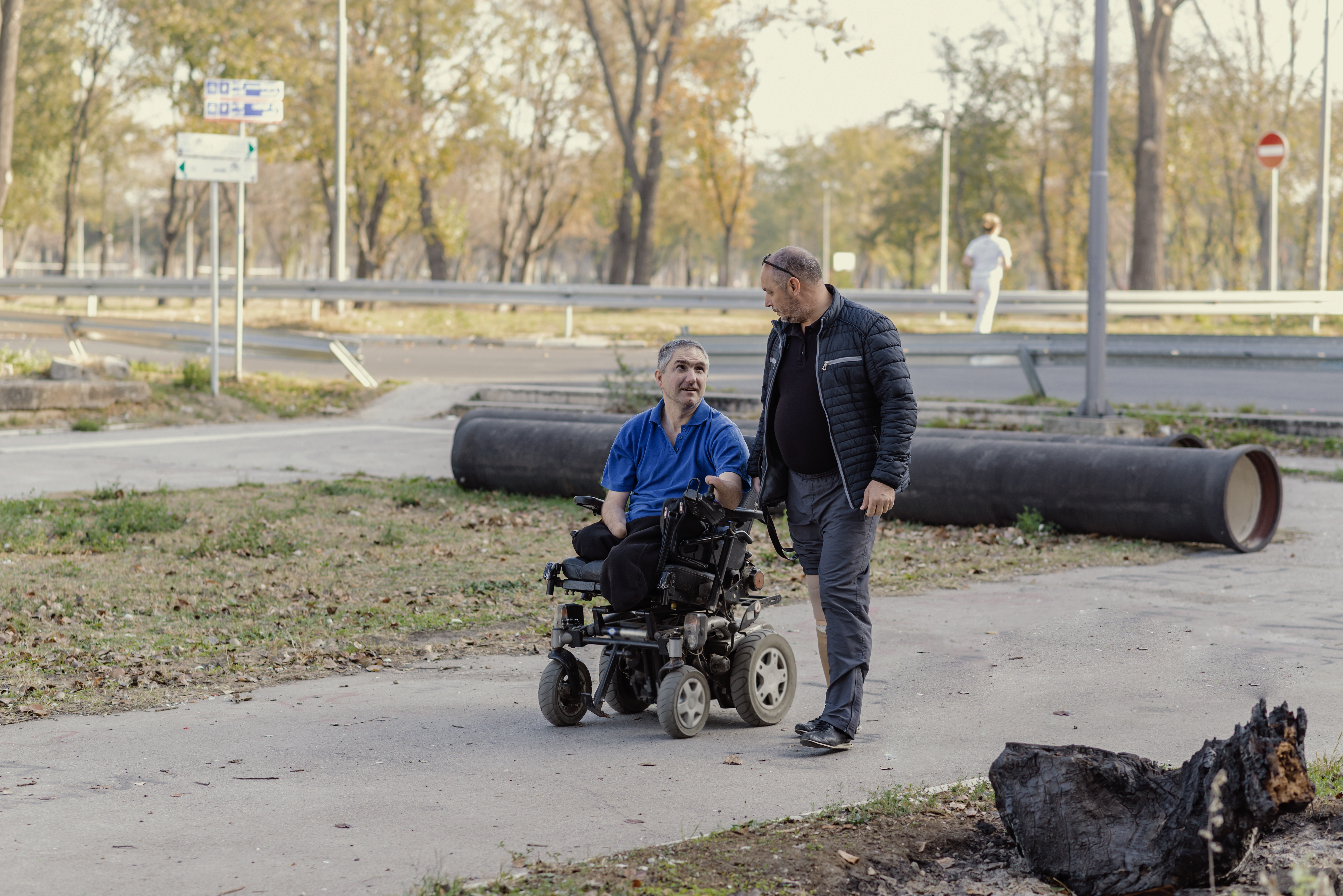 Power Wheelchair Walk with Friend