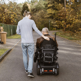 Caregiver Walking with Patient