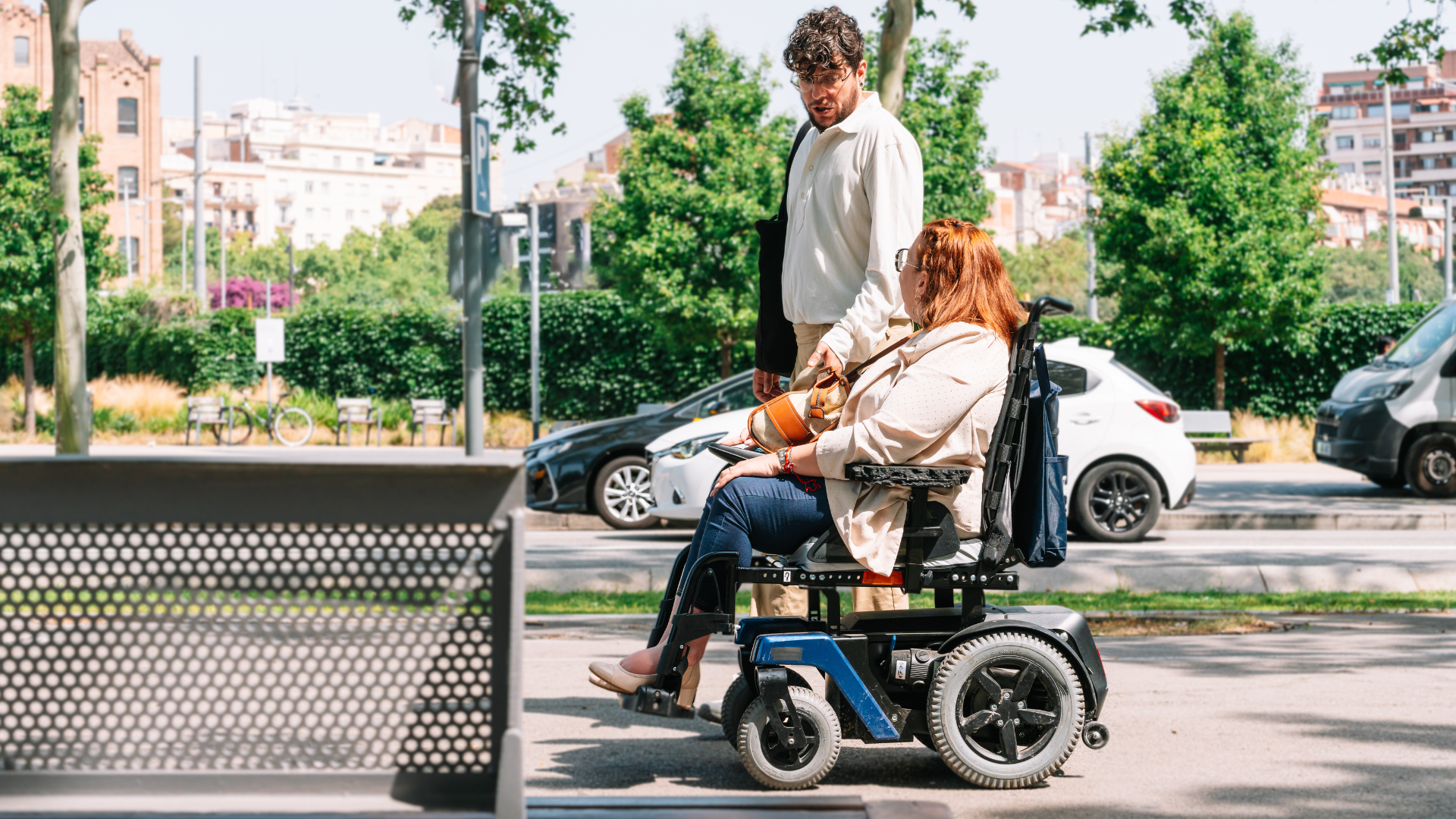 Woman in Wheelchair Talking with Friend