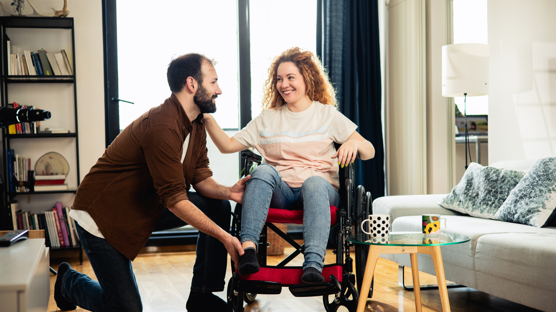 Home health aide helping patient in wheelchair