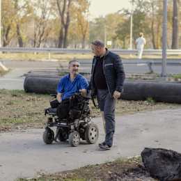 Power Wheelchair Walk with Friend