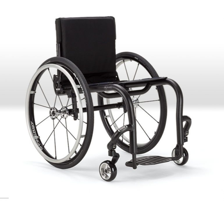 Side view of the Ki Mobility Rogue lightweight manual wheelchair.