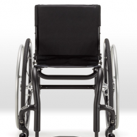 Rear view of the Ki Mobility Rogue lightweight manual wheelchair, showing a black seat and footrest. thumbnail
